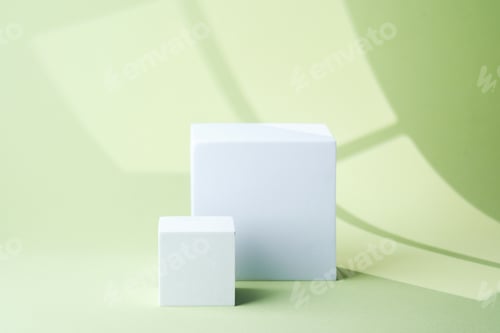 Preview: Two minimal white cube pedestals placed side by side on pastel green background