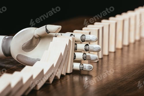 Preview: white robotic hand preventing wooden blocks from falling on desk