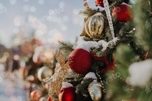 Preview: Close up of balls on christmas fir tree. Bokeh light garlands in background with copy space. Merry