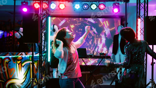 Preview: Female dancer partying at discotheque