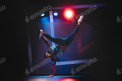 Preview: Man performing dance in spotlights