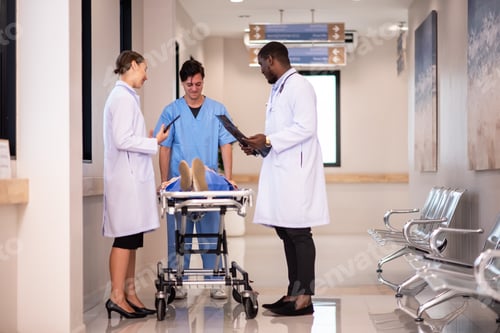 Preview: medics and patient on hospital gurney at emergency