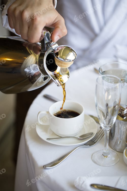 Preview: Man pours coffee