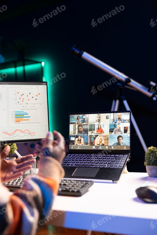 Preview: Black man using laptop to participate in online meetings