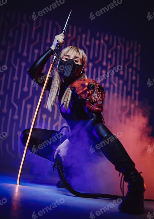 Preview: Young stylish woman with mask and sword
