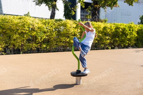 Preview: A schoolgirl plays on the playground in the city's backyard.