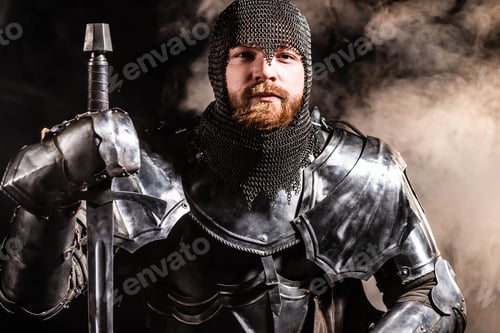 Preview: handsome knight in armor holding sword on black background