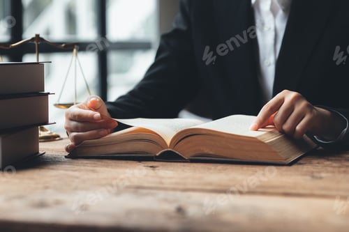 Preview: Lawyers read legal books defend their clients' cases.