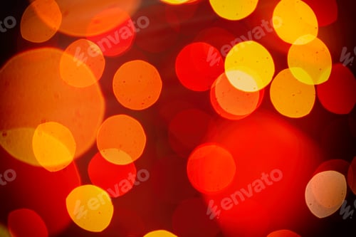 Preview: Christmas lights colorful bokeh background. Holiday festive atmosphere