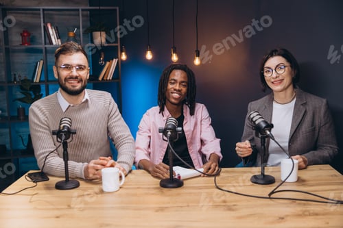 Preview: Podcasters discussing animatedly during recording session, surrounded by professional audio gear