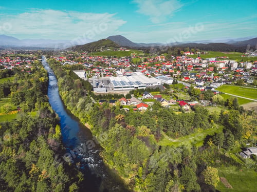 Preview: Suburbs and a river running trough, sunny spring day, nature awakening getting greener