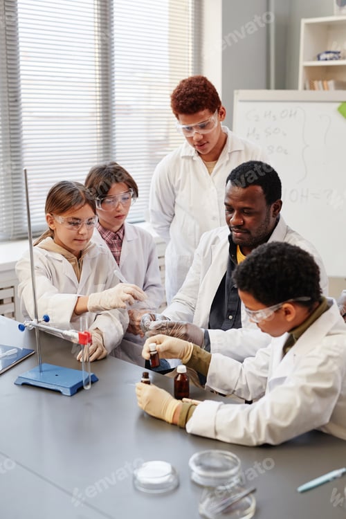 Preview: Teacher Showing Experiment in Science Lab