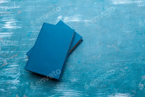 Preview: Stack of books on the table. Close up.