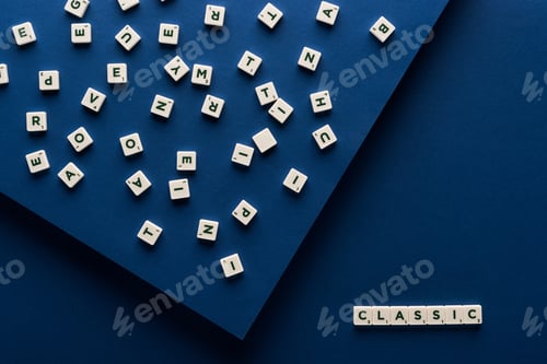 Preview: top view of classic lettering on cubes on blue background