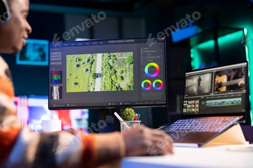 Preview: Videography specialist editing new movie clip for video montage