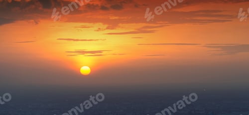 Preview: Sunset sky. Abstract nature background. Dramatic blue and orange, colorful clouds at twilight time.