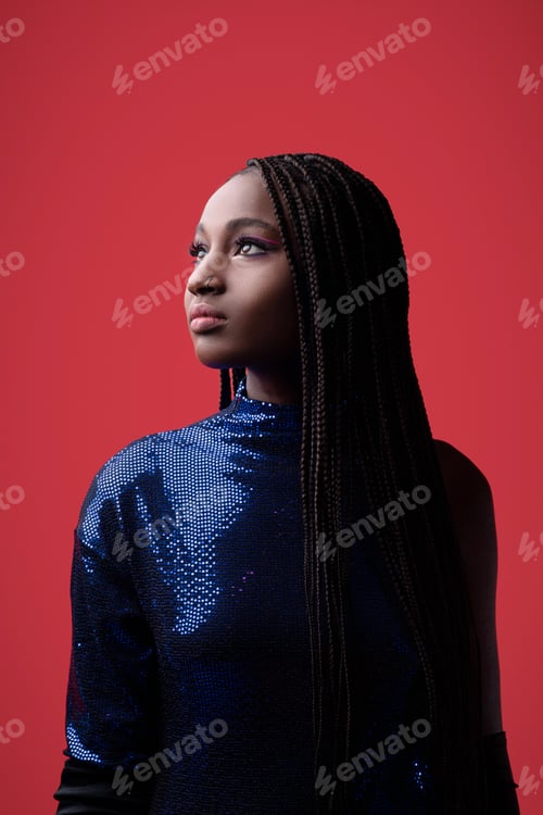 Preview: Portrait Of Beautiful Black Young Woman Wearing Sequin Party Dress Looking Aside