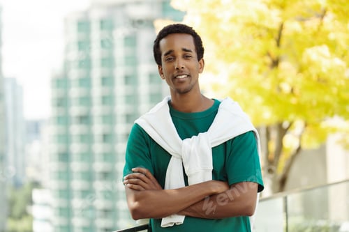 Preview: Closeup of handsome smiling african american man looking at camera