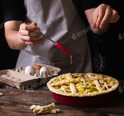 Preview: Man cooking apple pie with sugar and oil, still life food
