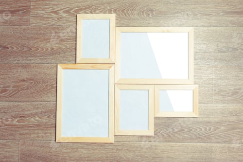 Preview: photo frames on the wooden wall