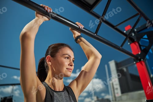 Preview: Close up of kind female person doing sport