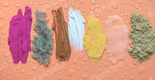 Preview: Different smears of cosmetics. Selective focus. Wet.