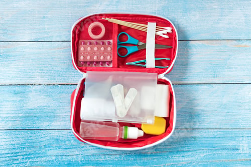 Preview: First aid kit with medical equipment and emergency objects at home or travel set