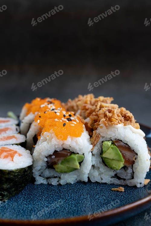 Preview: Sushi roll sushi with shrimp, avocado, red caviar , sesame. Sushi menu. Japanese food