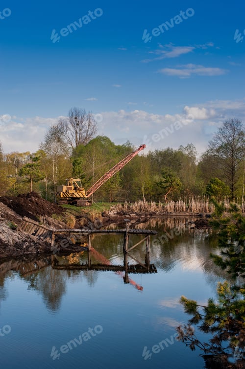 Preview: excavator cleans pond silt, deepening the channel