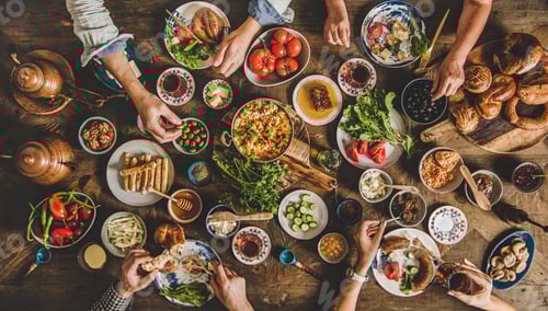 Preview: Flat-lay of Turkish family having traditional breakfast with various food