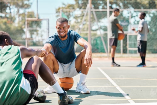 Preview: Sports, basketball and friends, men relax and fist bump on basketball court in happy summer. Friend