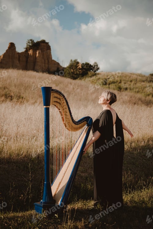 Preview: Musician embracing the harmony of nature with a harp