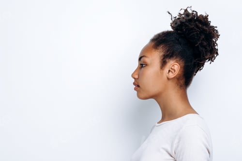 Preview: Young Woman Profile View with Curly Hair