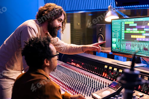 Preview: Young performer working on new album with his record producer in studio