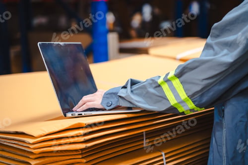 Preview: Professional worker supervisor inspector packaging stock order at factory warehouse
