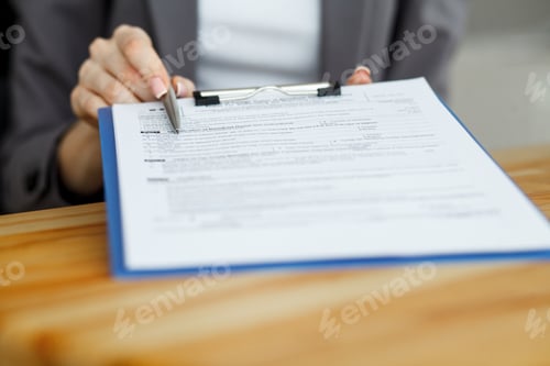 Preview: Contract waiting for a notary public sign on desk