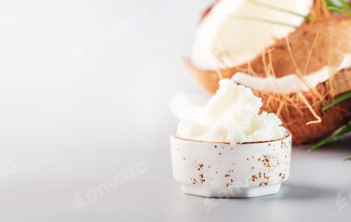 Preview: MCT Coconut butter or hard oil. Organic healthy food, beauty and SPA product. Gray background