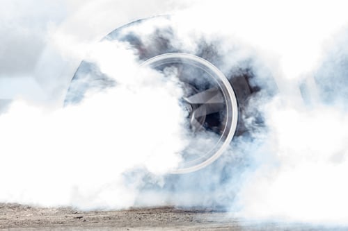 Preview: Close up car wheel with smoke on the asphalt road speed track, Car wheel drifting and smoking.
