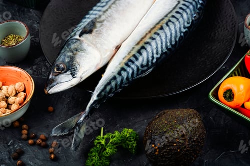 Preview: Uncooked mackerel fish with ingredients.