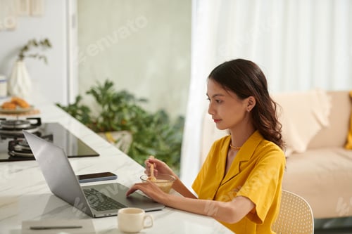 Preview: College Girl Eating Cornflakes with Milk