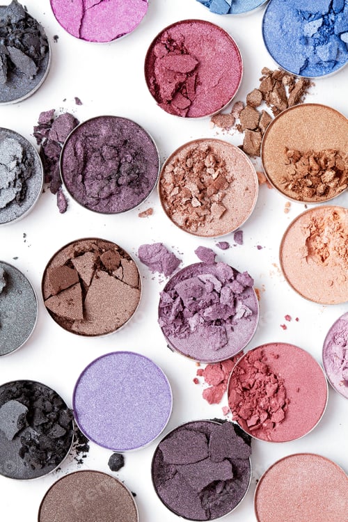 Preview: Crushed eyeshadows over the white background. Make up artist, beauty salon, beauty blog