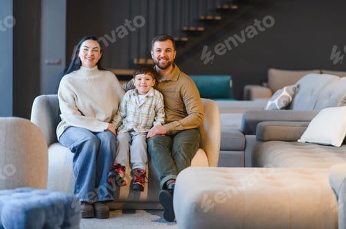 Preview: Happy family buying furniture for their new home