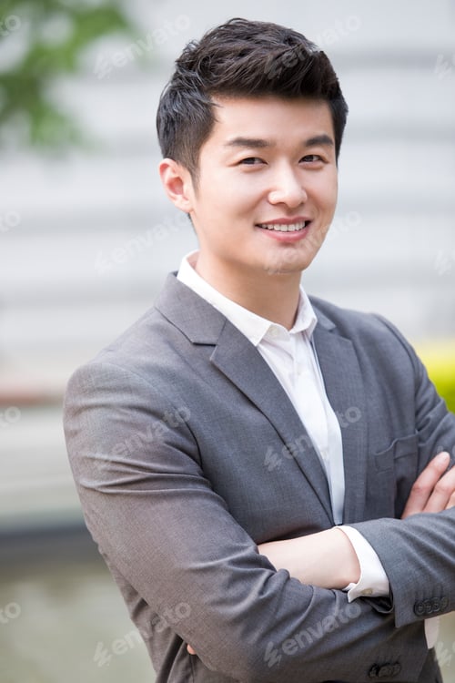 Preview: Portrait of young Chinese businessman