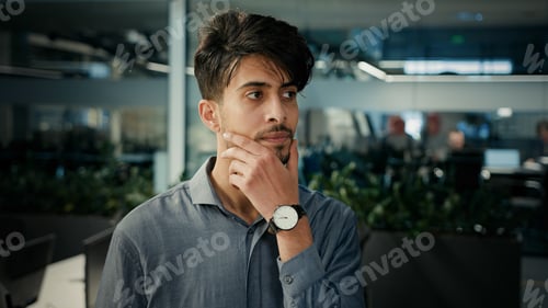 Preview: Thoughtful concentrated indian arabian man smart businessman office manager worker ceo agent