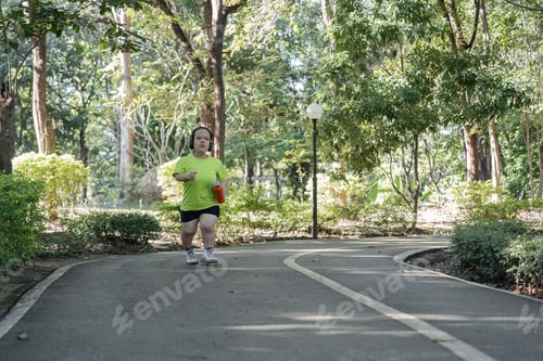 Preview: Empowered Young Woman with Disability Jogging for Fitness in a Park Setting, Embracing an Active