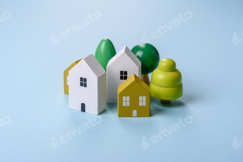 Preview: A small wooden house and keys as an idea for investing in your own home