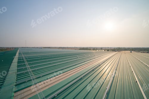 Preview: Metal sheet corrugated roof on rooftop of industry factory. Steel structure of station building