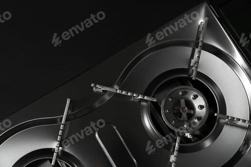 Preview: Portable gas stove on black background, top view. Military equipment