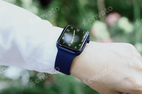 Preview: electronic watch on hand, business people