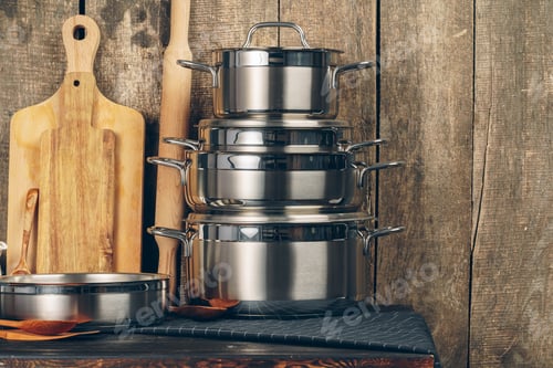 Preview: Set of dishware against old wooden background